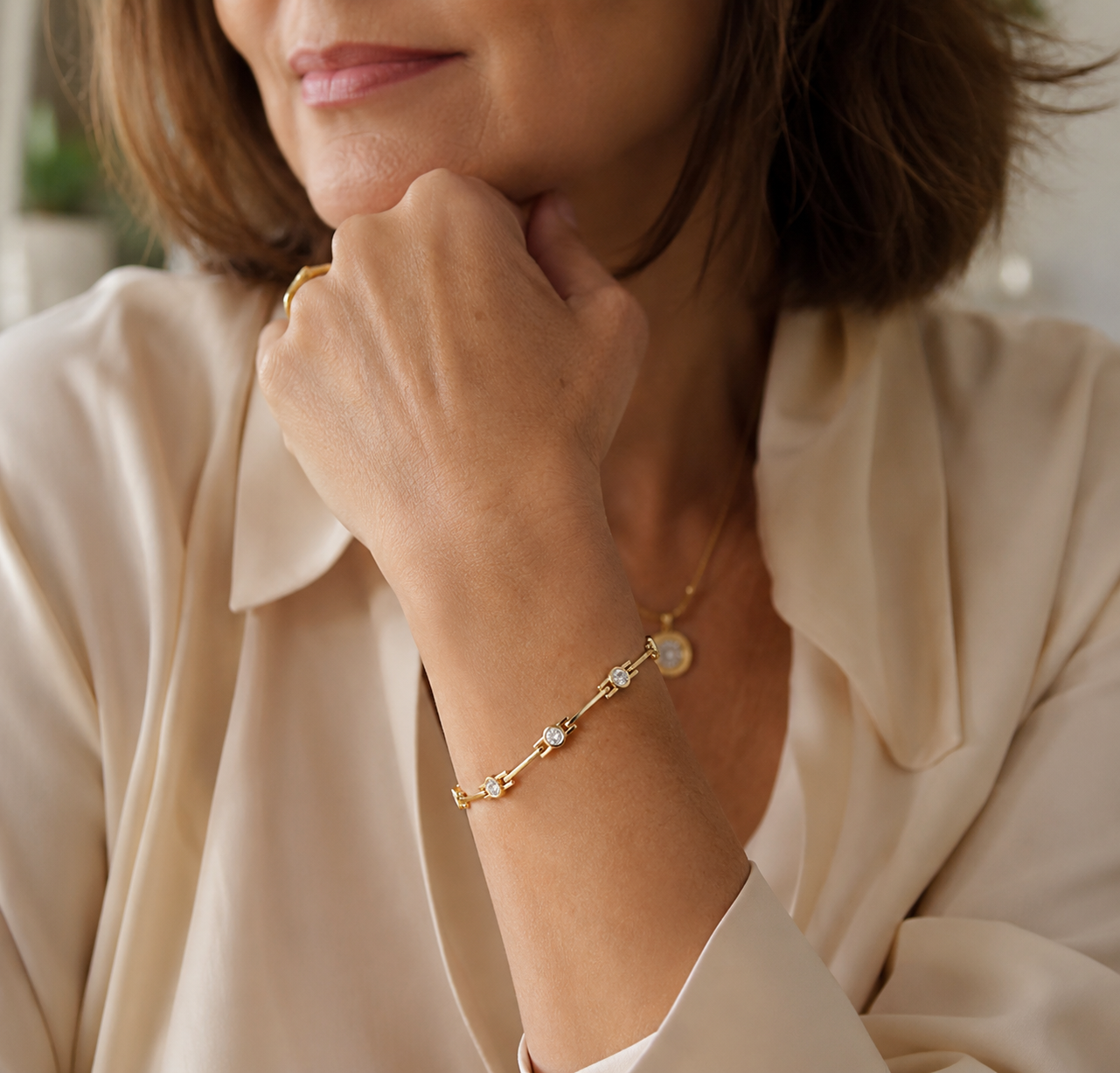 Elegant Gold Bracelet with Zirconia Stones